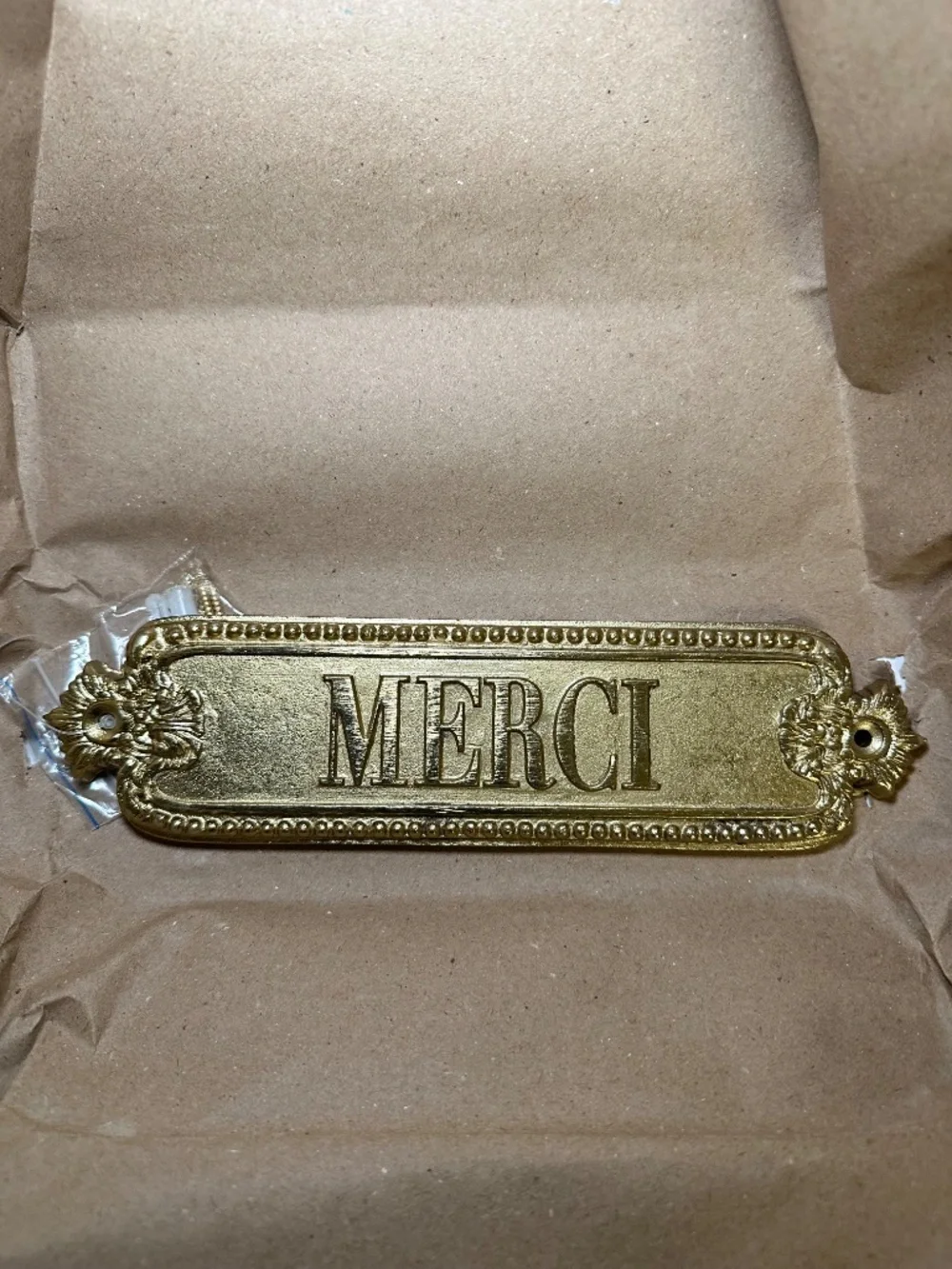 NIB French Merci Thank You Gold Metal Wall Decor Sign Plaque by Anthropologie